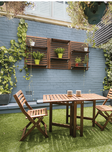 back yard with outdoor seating and barbecue with family. beautiful house