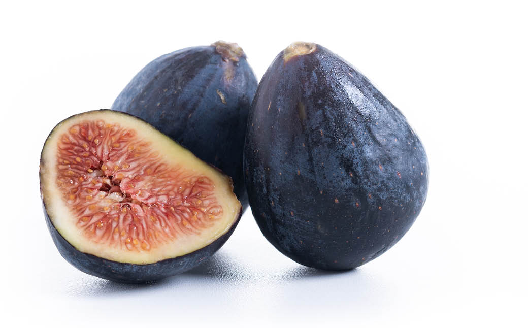 Fresh figs isolated on white background