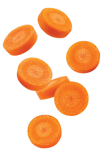Falling Carrot slice isolated on white background, clipping path, full depth of field