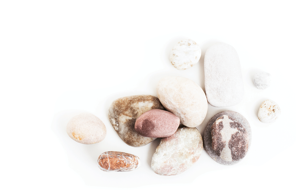 Marble zen stones stacked on white background in mindfulness concept