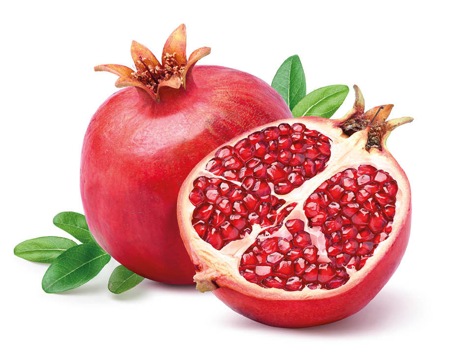 Fresh ripe pomegranate with cut in half isolated on white background.