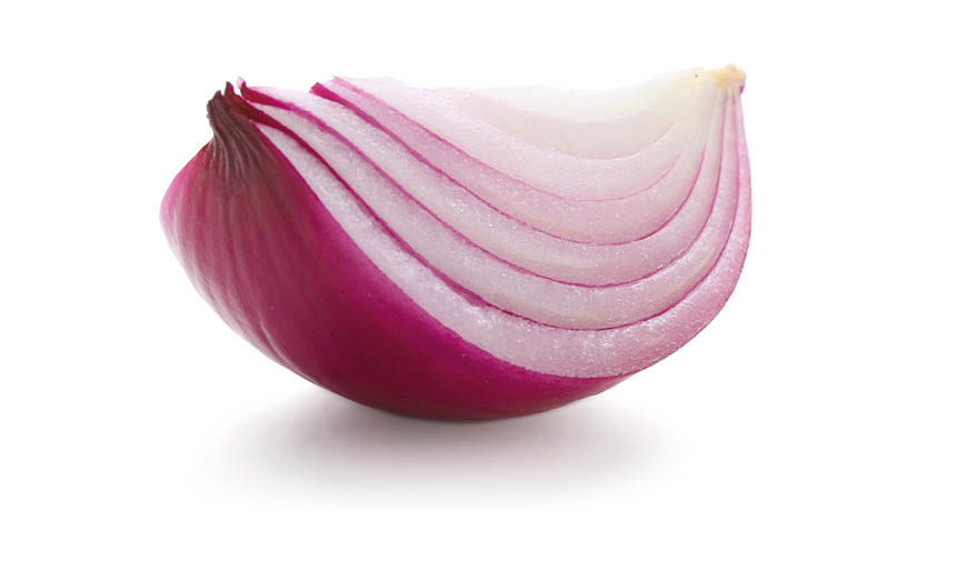 Cut red onion on white background